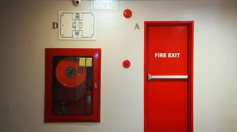 Fire exit door. Fire exit emergency door red color metal material Stock Photos