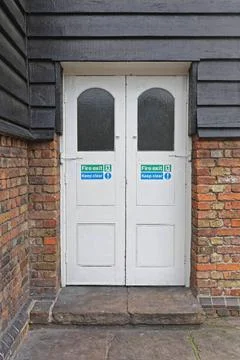 Fire Exit Door Fire Exit Safety Door at Old Building Copyright: xZoonar.co... Stock Photos