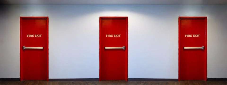 Fire exit door. Fire exit emergency door red color metal material Stock Photos