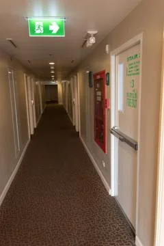 Fire exit door light sign. Stock Photos