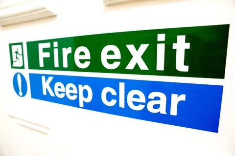 Fire exit keep clear sign Stock Photos