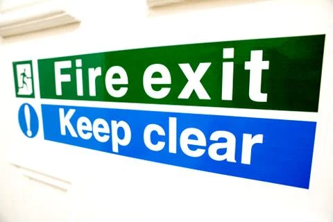 Fire exit keep clear sign Stock Photos