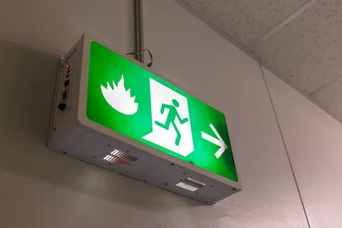 Fire exit light sign Stock Photos