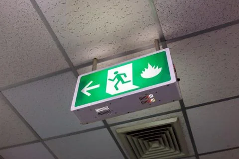 Fire exit light sign Photos