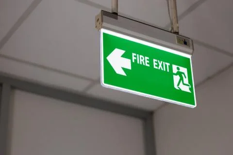 Fire exit light sign Stock Photos