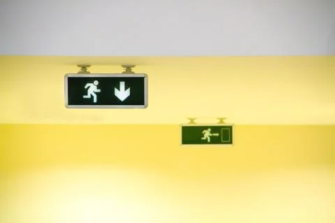 Fire exit light sign Stock Photos