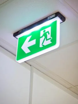 Fire exit sign Stock Photos