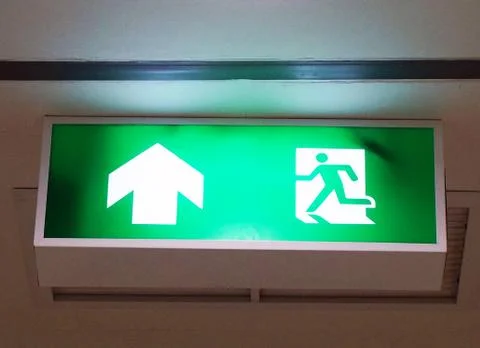 Fire exit sign Stock Photos