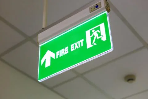 Fire exit sign Stock Photos