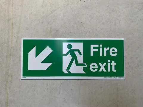 Fire exit sign Stock Photos