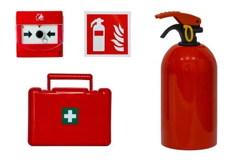 Fire extinguisher, first aid kit, fire alarm button and safety sign isolate.. Stock Photos