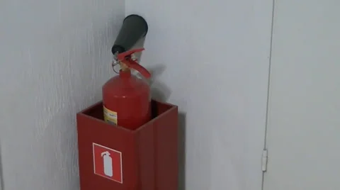  	Fire extinguisher in office Stock Footage 56937996
