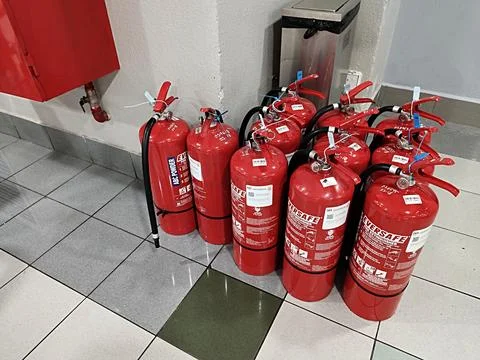 Fire extinguisher type. Required to be installed in all buildings Stock Photos