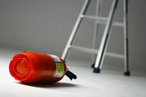 Fire Extinguisher on white background Stock Photos