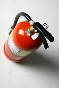 Fire Extinguisher on white background Stock Photos