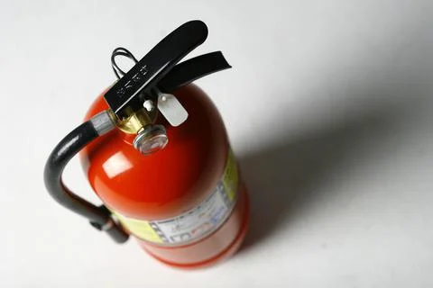 Fire Extinguisher on white background Stock Photos