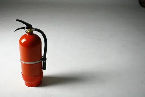 Fire Extinguisher on white background Stock Photos