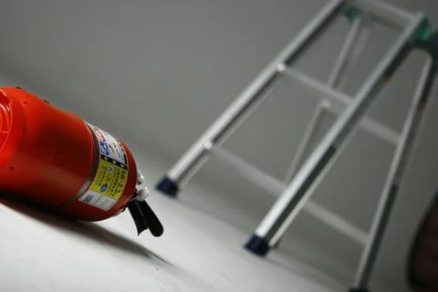 Fire Extinguisher on white background Stock Photos