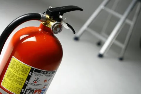 Fire Extinguisher on white background Stock Photos