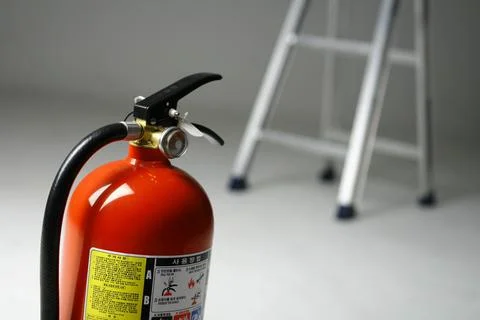 Fire Extinguisher on white background Stock Photos