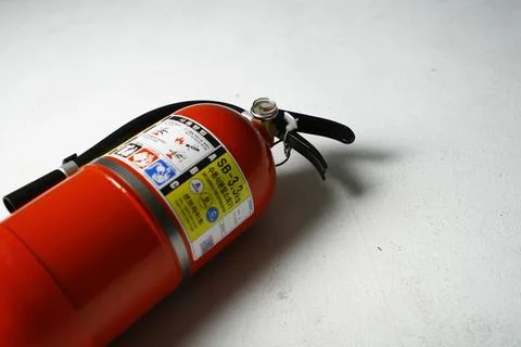Fire Extinguisher on white background Stock Photos