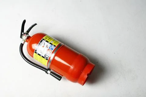 Fire Extinguisher on white background Stock Photos