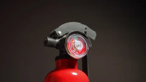 Fire extinguishers may use for auto car fire accidents. Small rechargeable .. Stock Footage 307710211