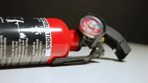 Fire extinguishers may use for auto car fire accidents. Small rechargeable .. Stock Footage 313366736