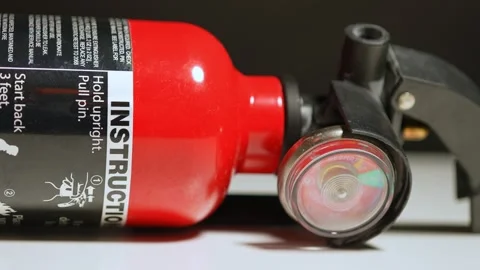 Fire extinguishers may use for auto car fire accidents. Small rechargeable .. Stock Footage 313366738