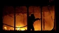 Fire extinguishing, fire brigade inside burning premises HD Footage