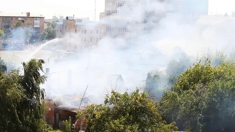 Fire extinguishing in the old house Stock-Footage 79499669
