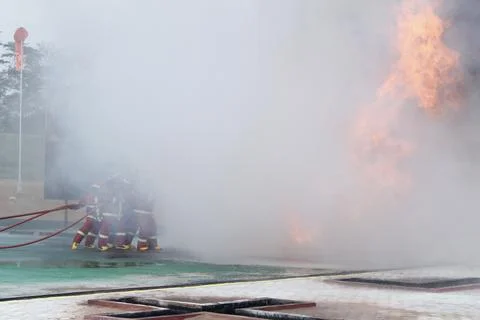 Fire extinguishing Stock Photos