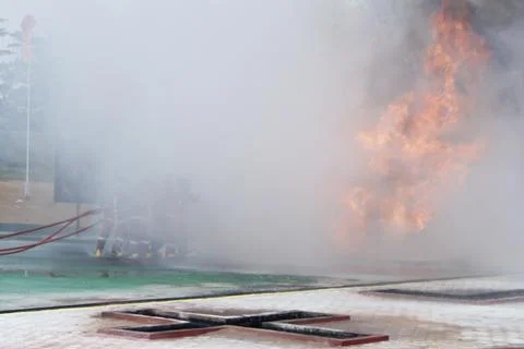 Fire extinguishing Stock Photos