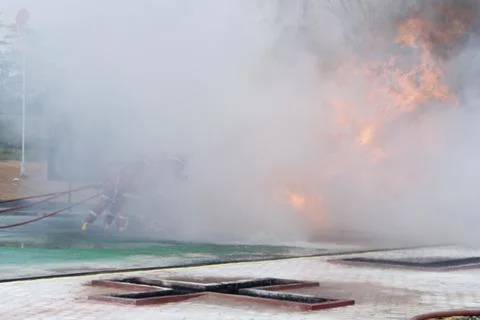 Fire extinguishing Stock Photos