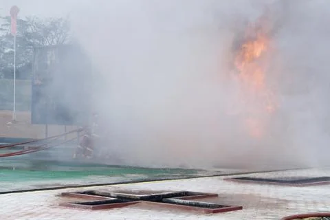 Fire extinguishing Stock Photos