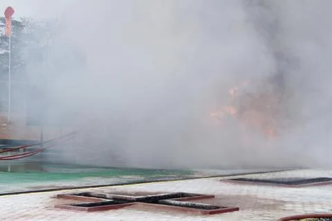Fire extinguishing Stock Photos