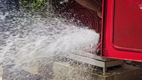 Fire extinguishing water spray Stock Footage 284507965