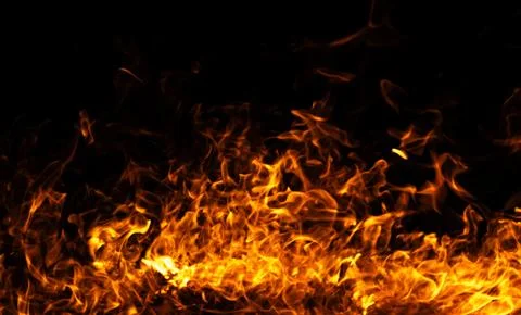 Fire fiery abstract texture. Fire hot glowing motion. Fire intense burning Stock Photos