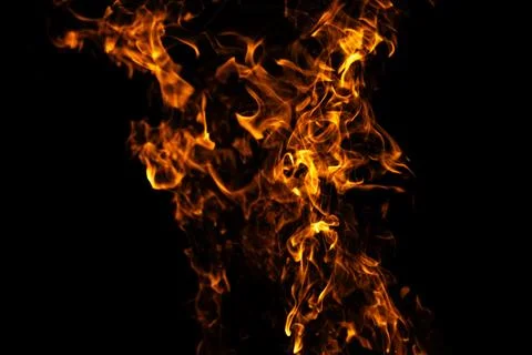 Fire fiery abstract texture. Fire hot glowing motion. Fire intense burning fl Stock Photos