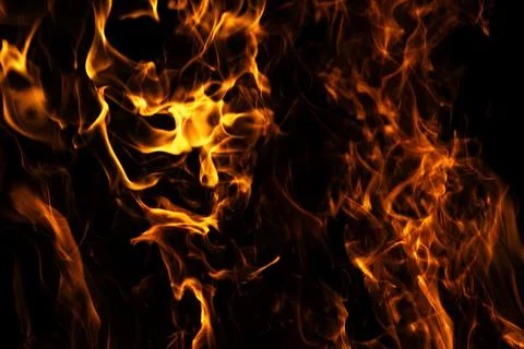 Fire fiery abstract texture. Fire hot glowing motion. Fire intense burning fl Stock Photos