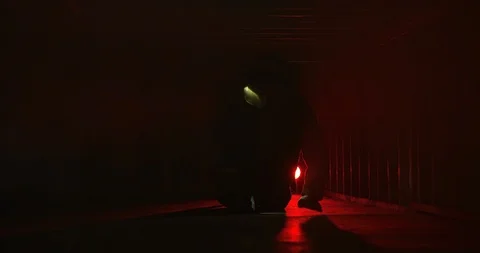 Fire Fighter crawling in confined space with smoke filling the air Stock Footage 107002757