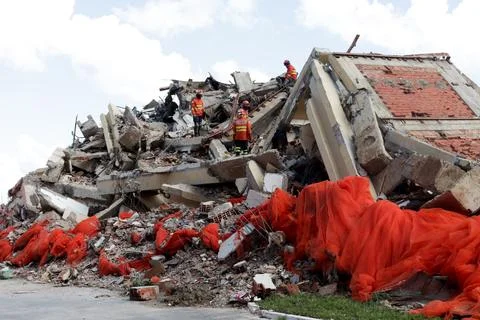 Fire Fighter inspecting the rubble of The Torre Palace Hotel in Brasilia Stock Photos