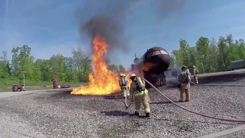 Fire Fighters aircraft burn training at Pittsburgh International Airport Stock Footage