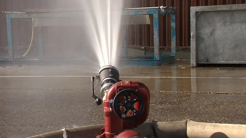 Fire fighters exercise Waterhose Stock Footage 128314357
