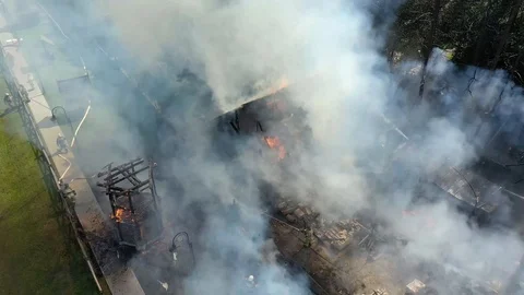 Fire fighters have their work cut out for them as they try to contain huge fire Stock Footage 113112167