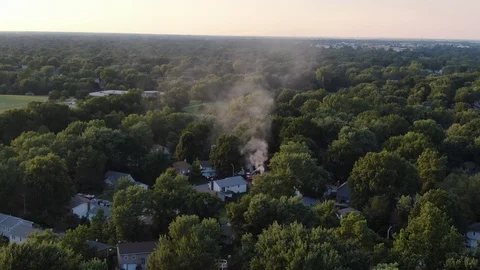 Fire fighters putting out a fire Stock Footage 114750243