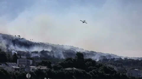 Fire fighting airplane in action Stock Footage 8911995