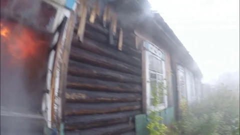 Fire fighting service. The fire. Extinguishing fire with water. Stock Footage 80450765