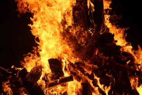 Fire in fireplace on black Foto stock