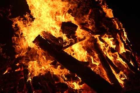 Fire in fireplace on black Stock Photos